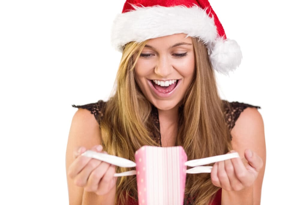 29084798_festive-blonde-opening-a-gift-bag